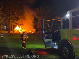 Crews operating on the scene of a large outbuilding fire, 7300 block Gaither Road on 9/28/23