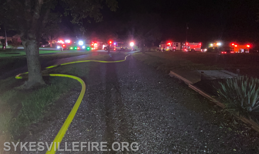 Crews operating on the scene of a large outbuilding fire, 7300 block Gaither Road on 9/28/23